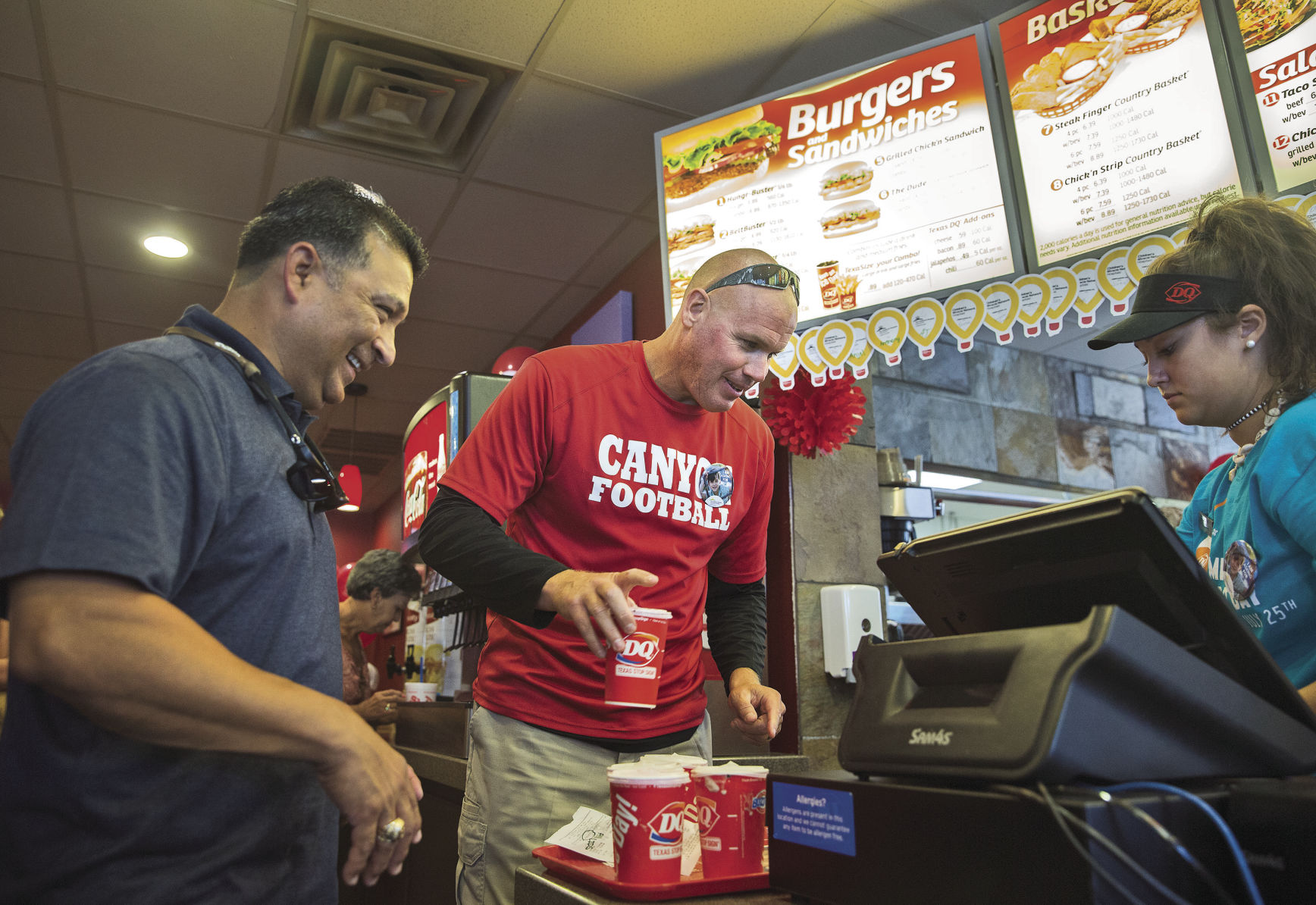 Serving up a side of coaching at Dairy Queen to raise money